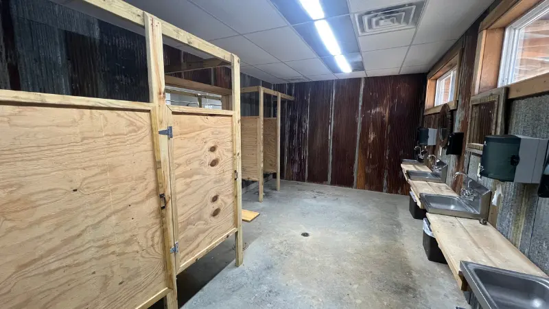 bathrooms displaying upscale mosaic showers at Hot Springs Campground & RV Park